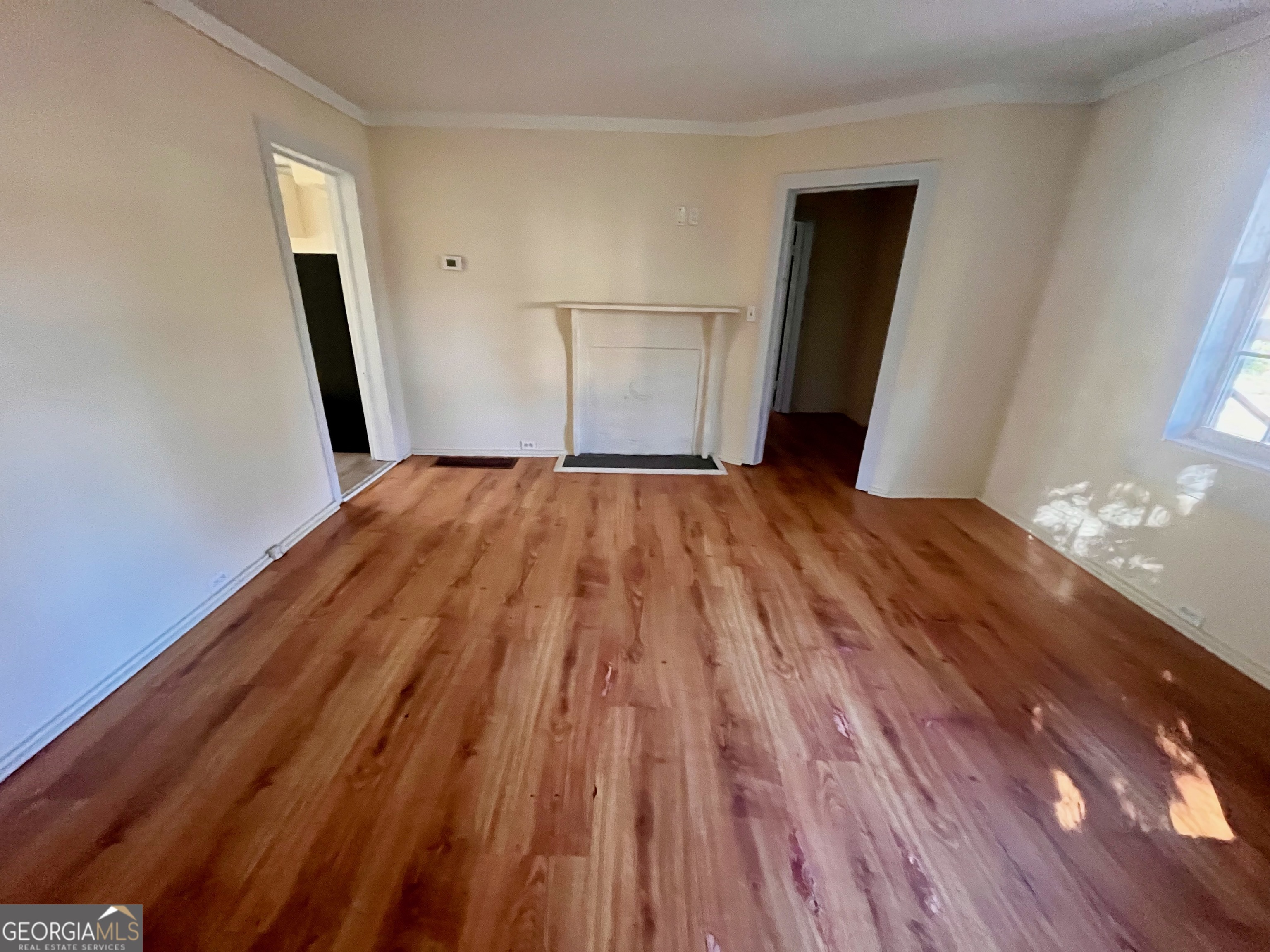 1202 Juniper Street LaGrange, GA 30240 - Photo 11 of 15 a view of empty room with wooden floor