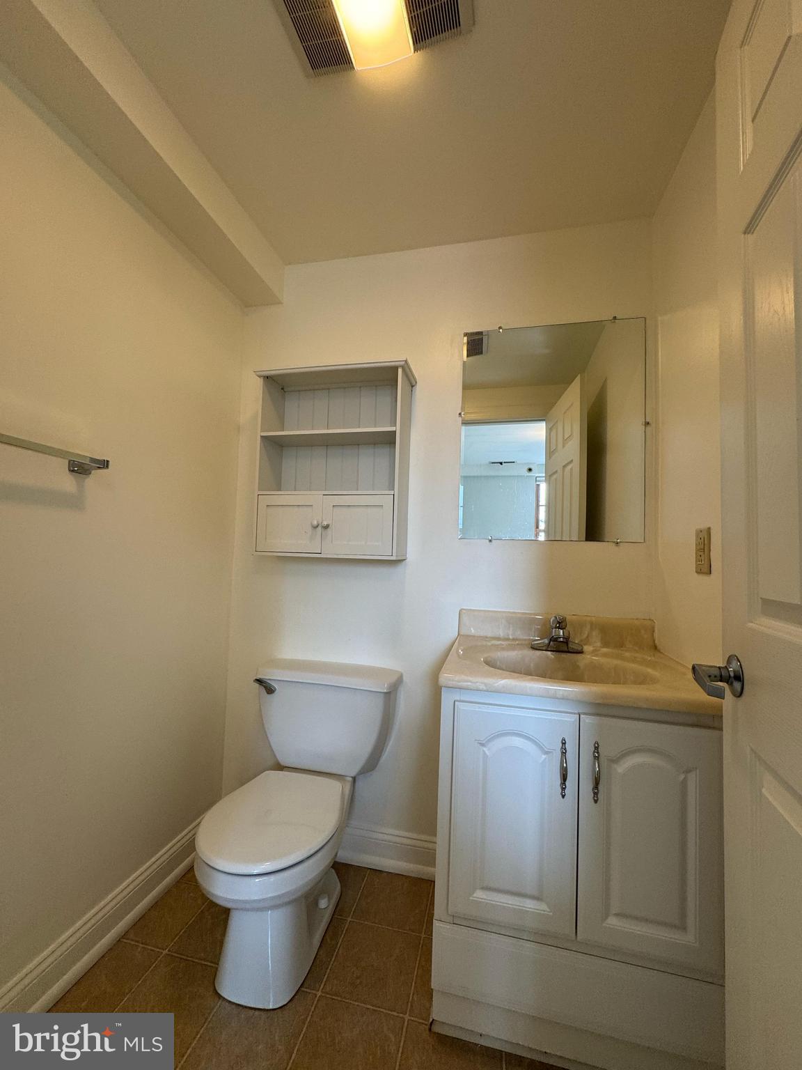 714 West Avenue, Unit 2 Jenkintown, PA 19046 - Photo 13 of 19 a bathroom with a toilet a sink and mirror