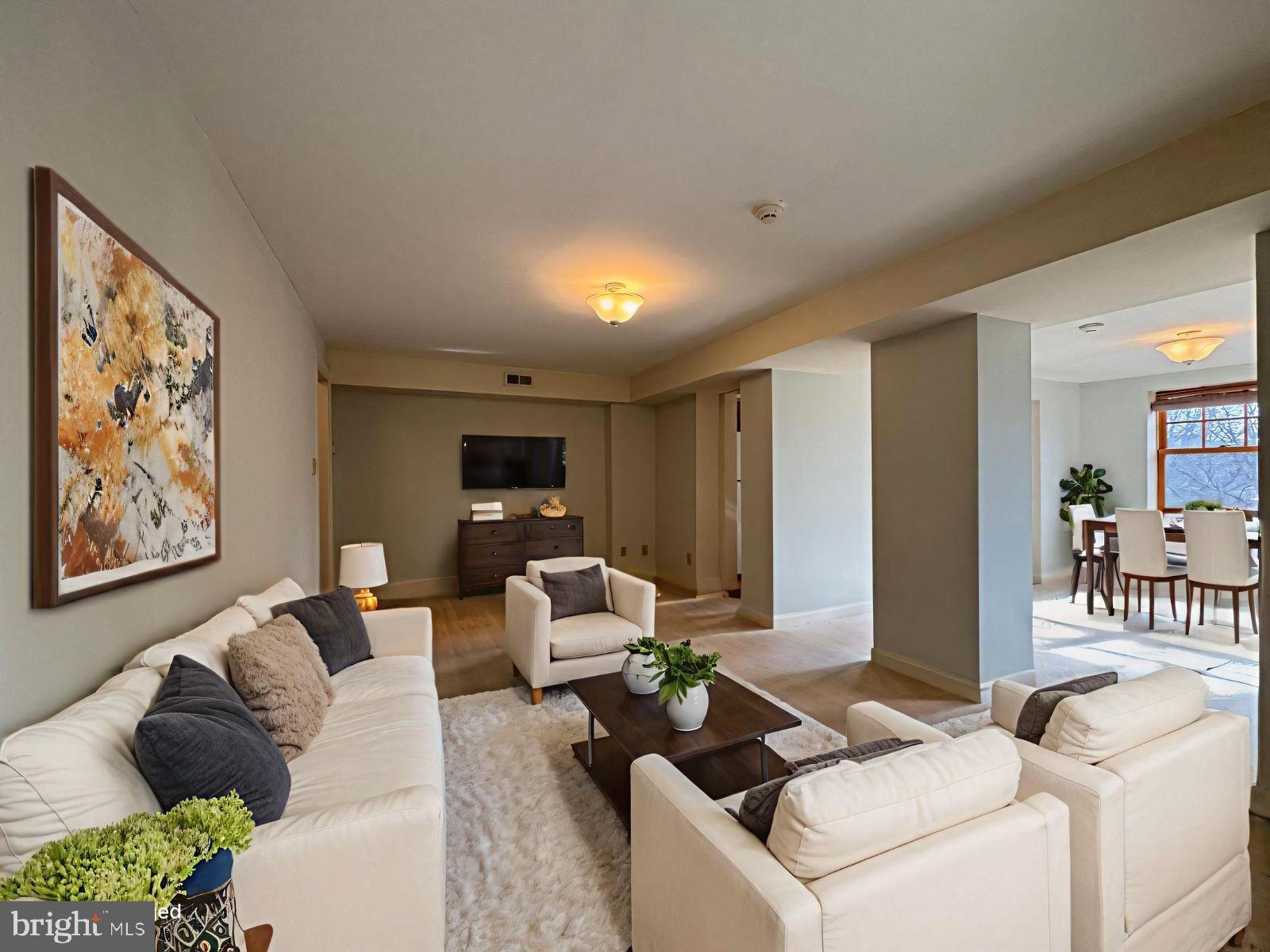 714 West Avenue, Unit 2 Jenkintown, PA 19046 - Photo 6 of 19 a living room with furniture and a flat screen tv