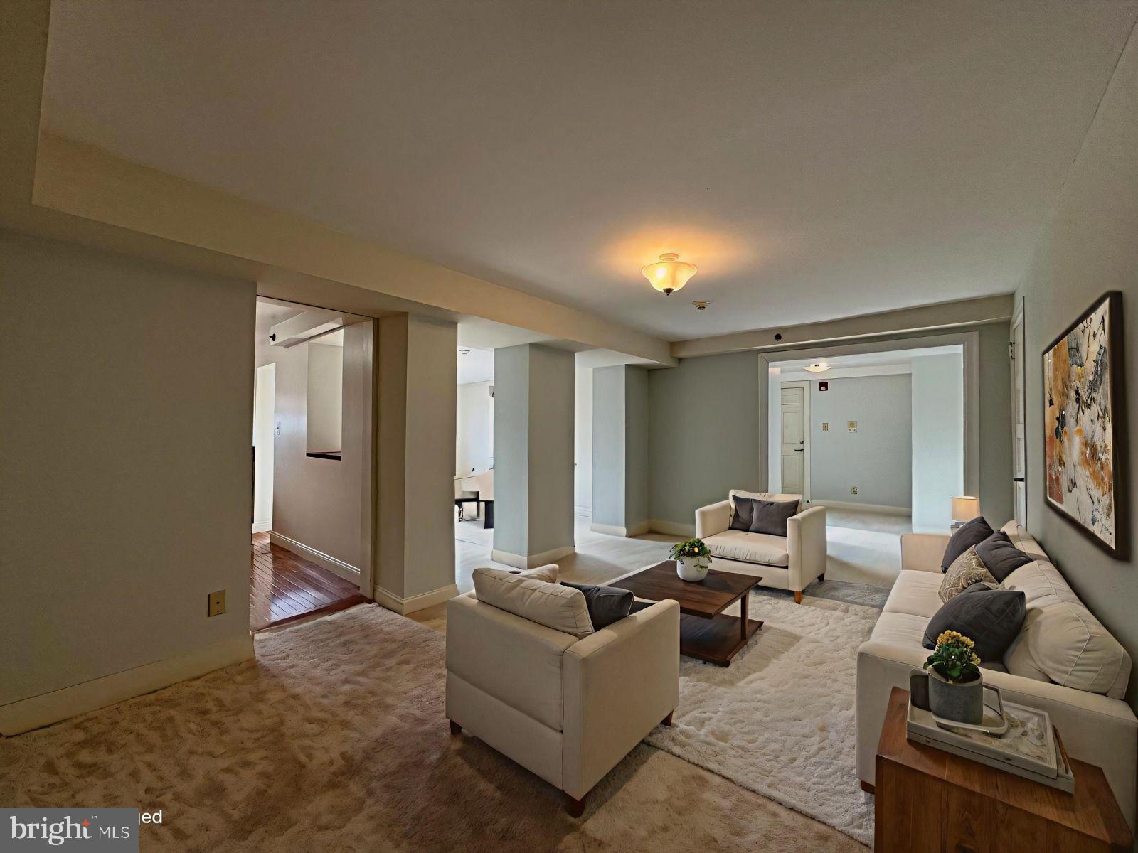 714 West Avenue, Unit 2 Jenkintown, PA 19046 - Photo 7 of 19 a living room with furniture and a large window