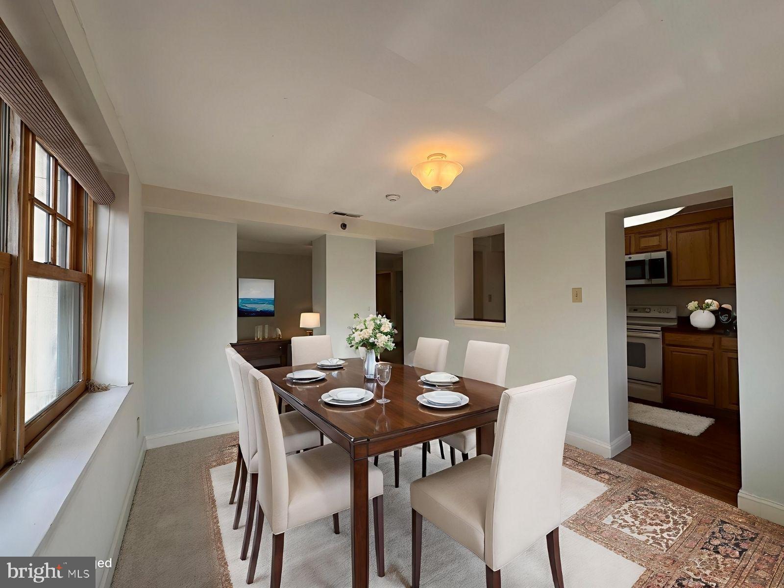 714 West Avenue, Unit 2 Jenkintown, PA 19046 - Photo 9 of 19 a view of a dining room with furniture and window