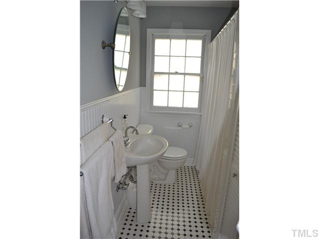 309 Glascock Street Raleigh, NC 27604 - Photo 16 of 23 full bath in hallway between bedrooms 2 and 3