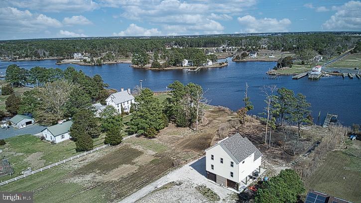 27068 Annie Hyland Road Princess Anne, MD 21853 - Photo 2 of 12 an aerial view of a house with a lake view