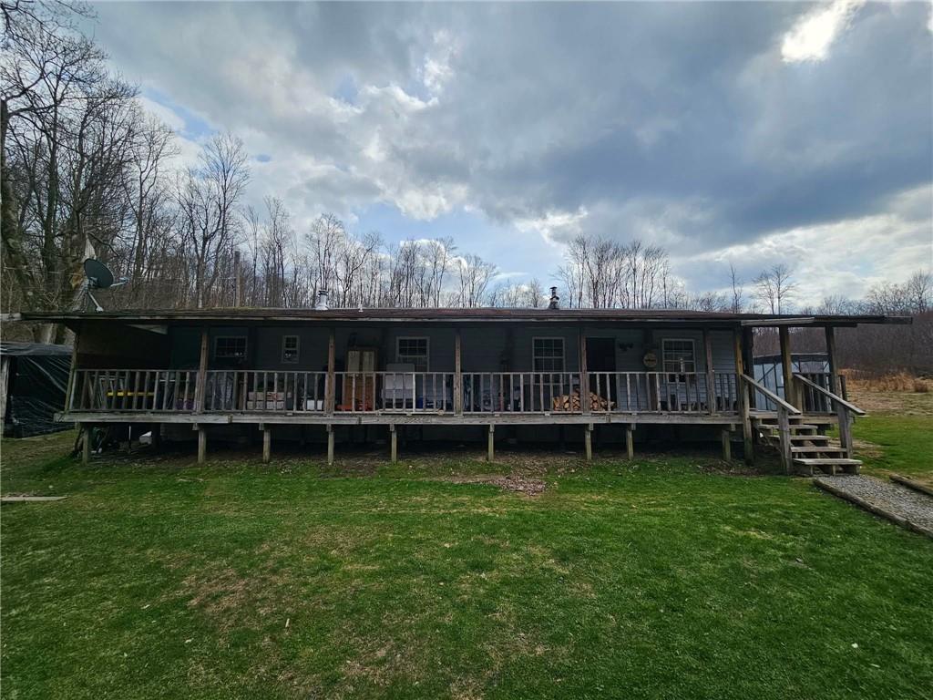 660 Clinton Lane White, PA 15490 - Photo 2 of 26 a view of a house with a yard and sitting area