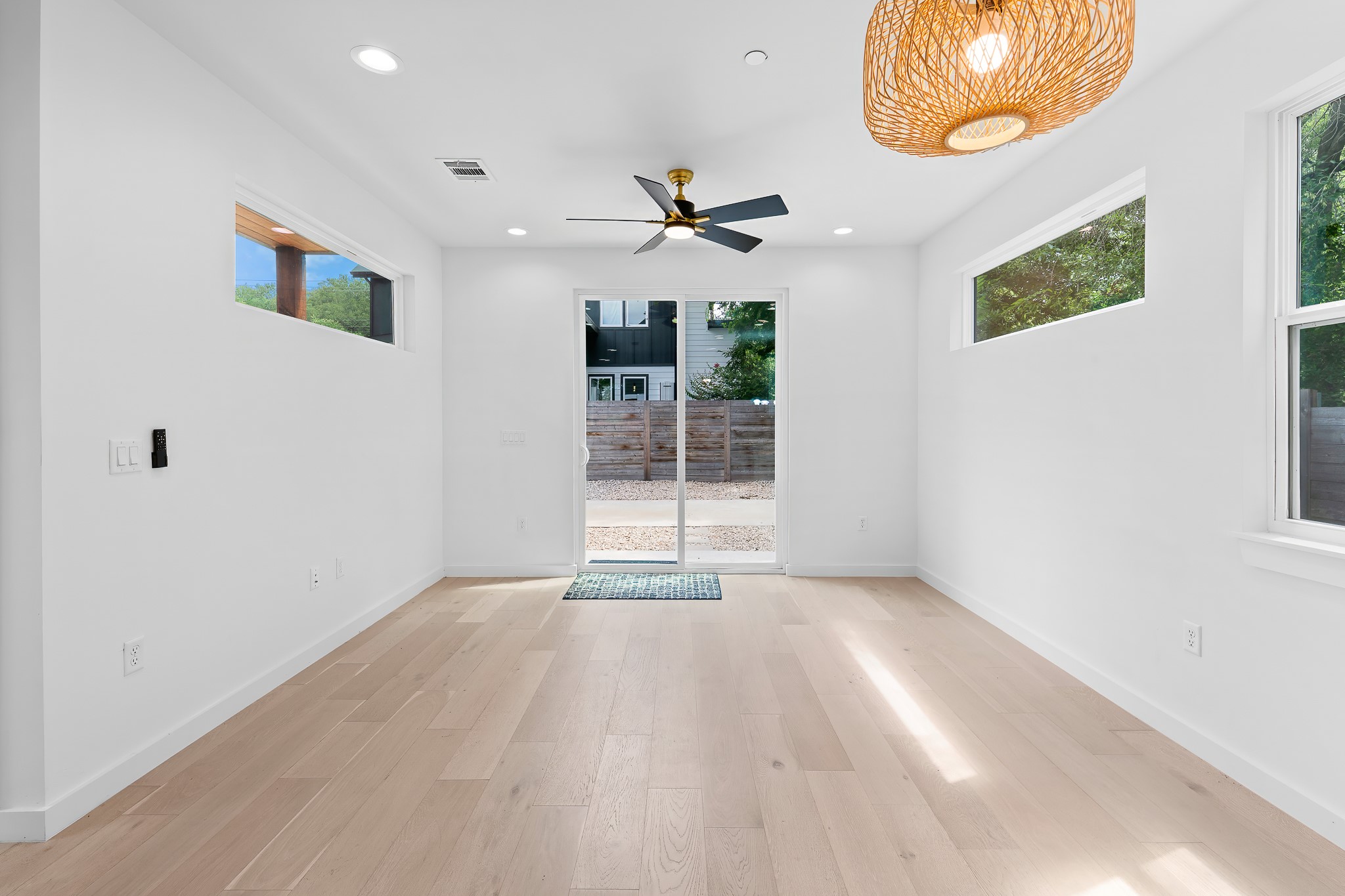 5305 Ledesma Road, Unit 4 Austin, TX 78721 - Photo 10 of 40 Hardwood floors and generous natural light create an inviting atmosphere.