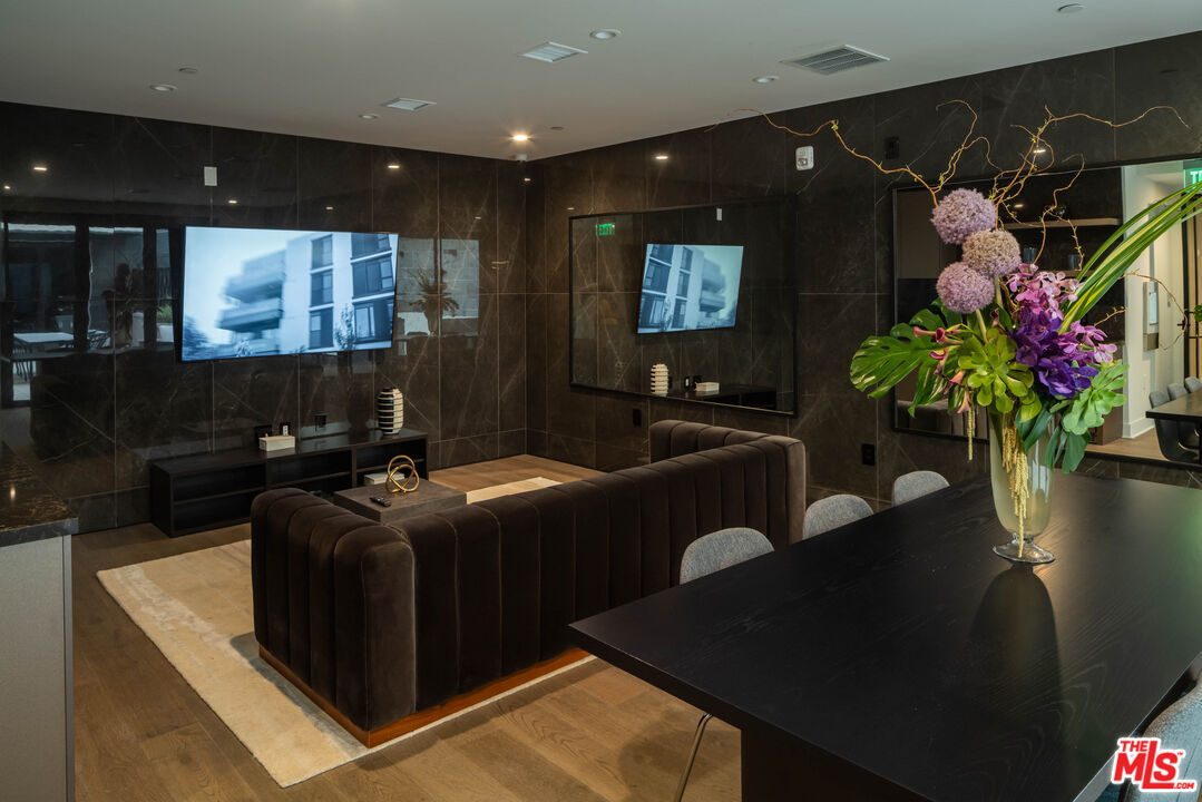 411 South Hamel Road, Unit 106 Los Angeles, CA 90048 - Photo 16 of 17 a living room with furniture