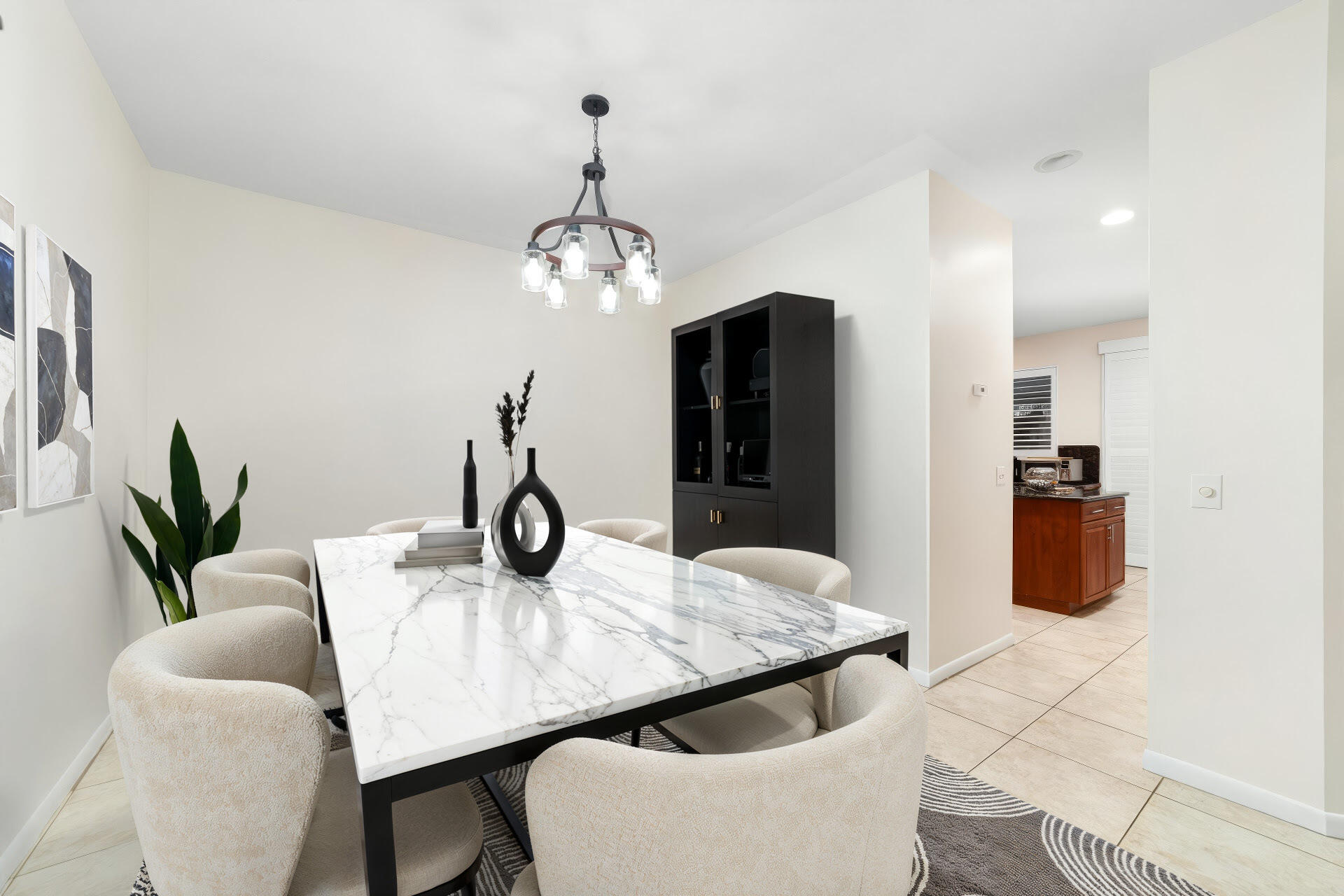 20508 Vía Marisa Boca Raton, FL 33498 - Photo 8 of 31 a dining room with furniture and chandelier