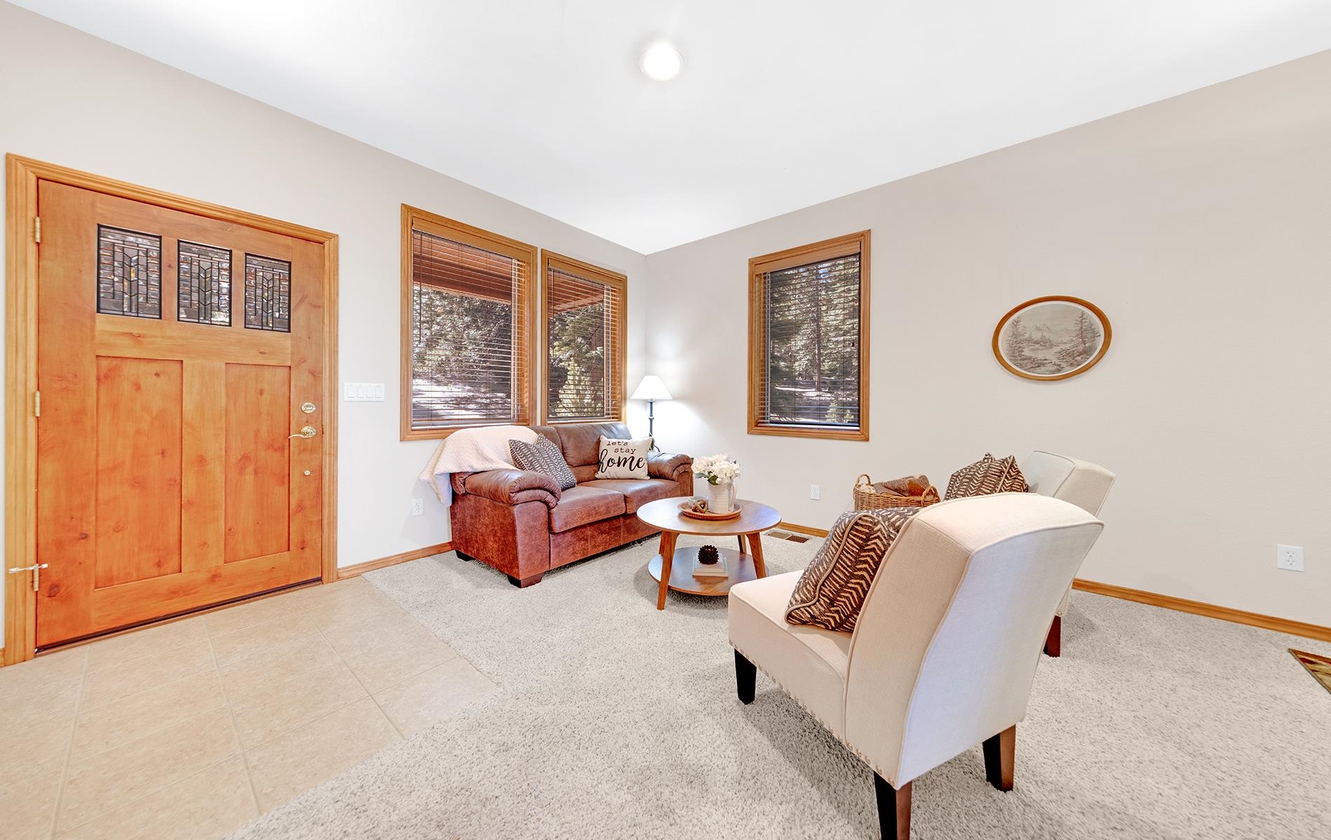 627 Deep Forest Road Lake Almanor, CA 96137 - Photo 3 of 29 a living room with furniture and a window