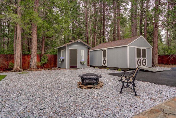 37105 Sapphire Road Burney, CA 96013 - Photo 29 of 39 a view of a house with backyard
