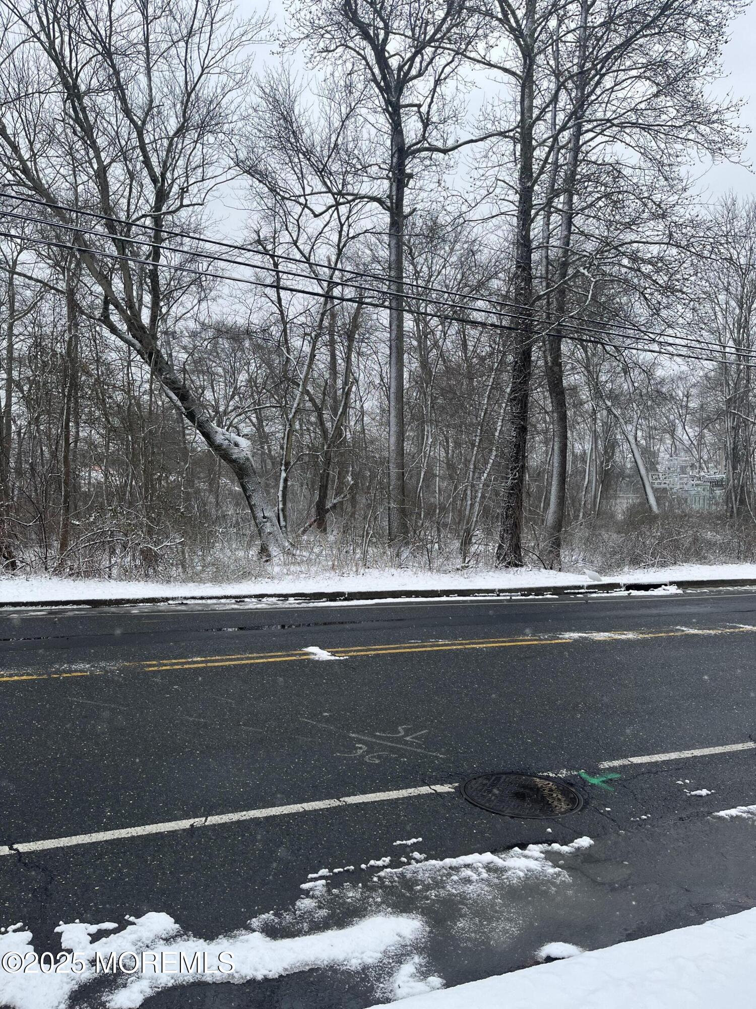 1114 Pinebrook Road Tinton Falls, NJ 07724 - Photo 1 of 4 a view of a house with a yard