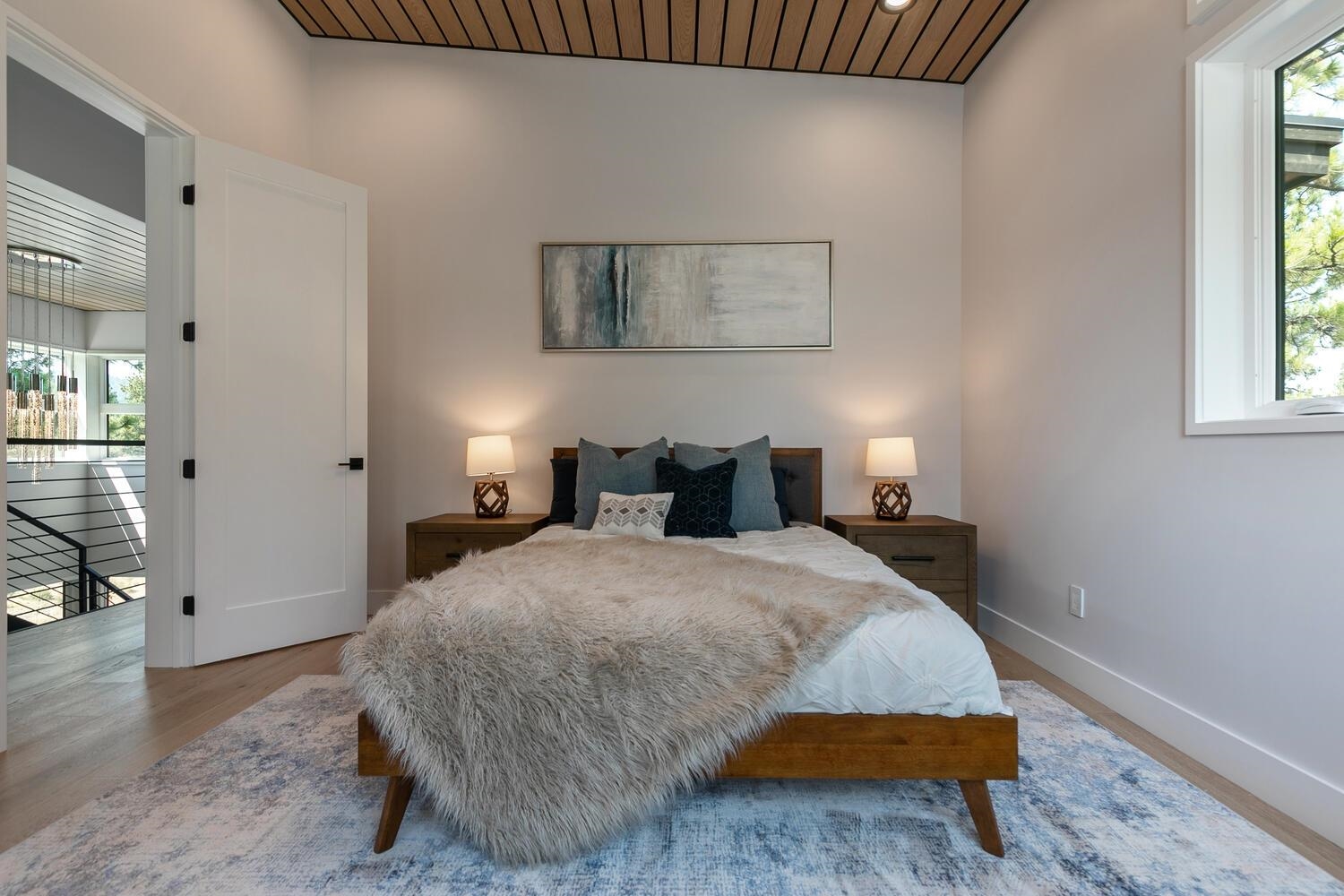 11614 Henness Road Truckee, CA 96161 - Photo 12 of 21 a bedroom with bed and window