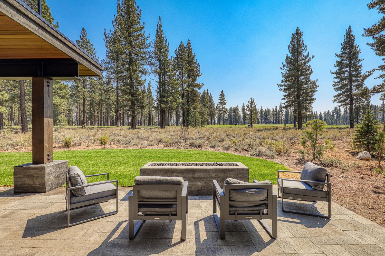 11614 Henness Road Truckee, CA 96161 - Photo 20 of 21 a view of a wooden chairs and table in the patio