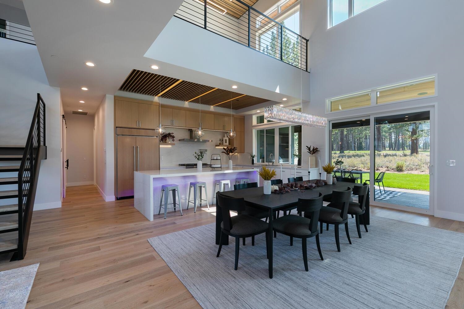 11614 Henness Road Truckee, CA 96161 - Photo 6 of 21 a view of a dining room with furniture and wooden floor