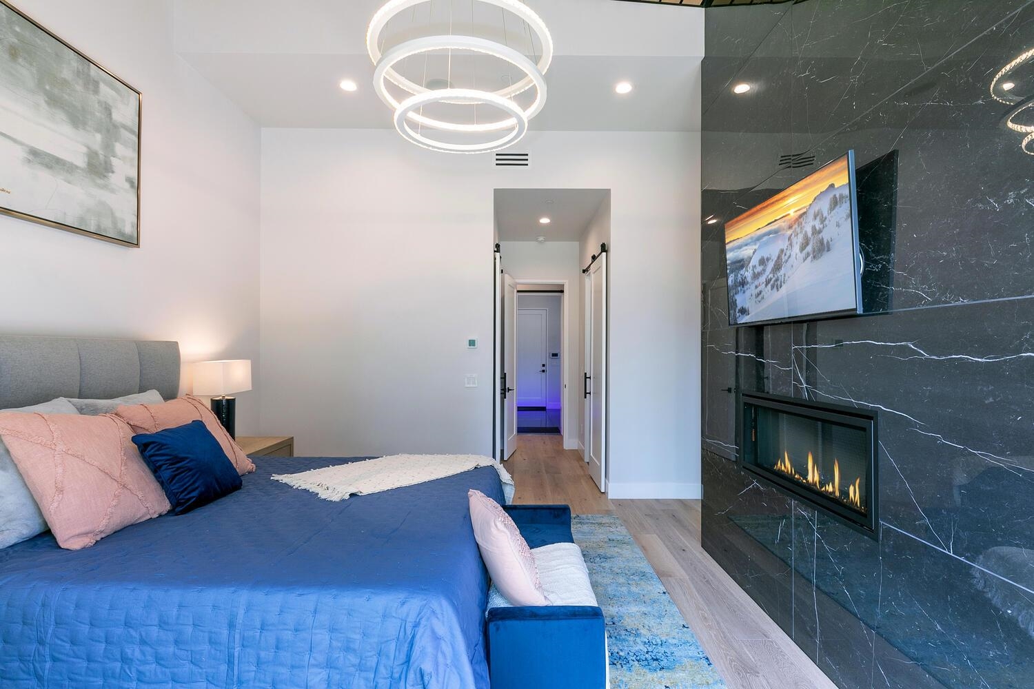 11614 Henness Road Truckee, CA 96161 - Photo 7 of 21 a bedroom with a bed and a fireplace