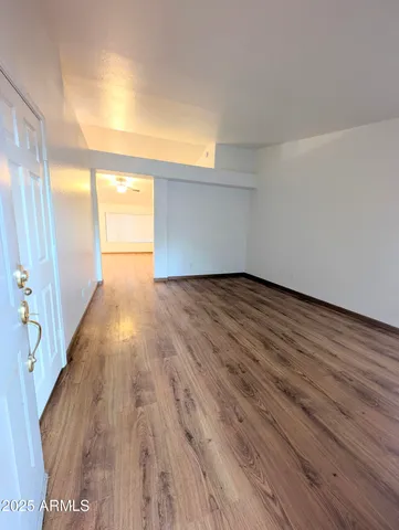 a view of an empty room and window