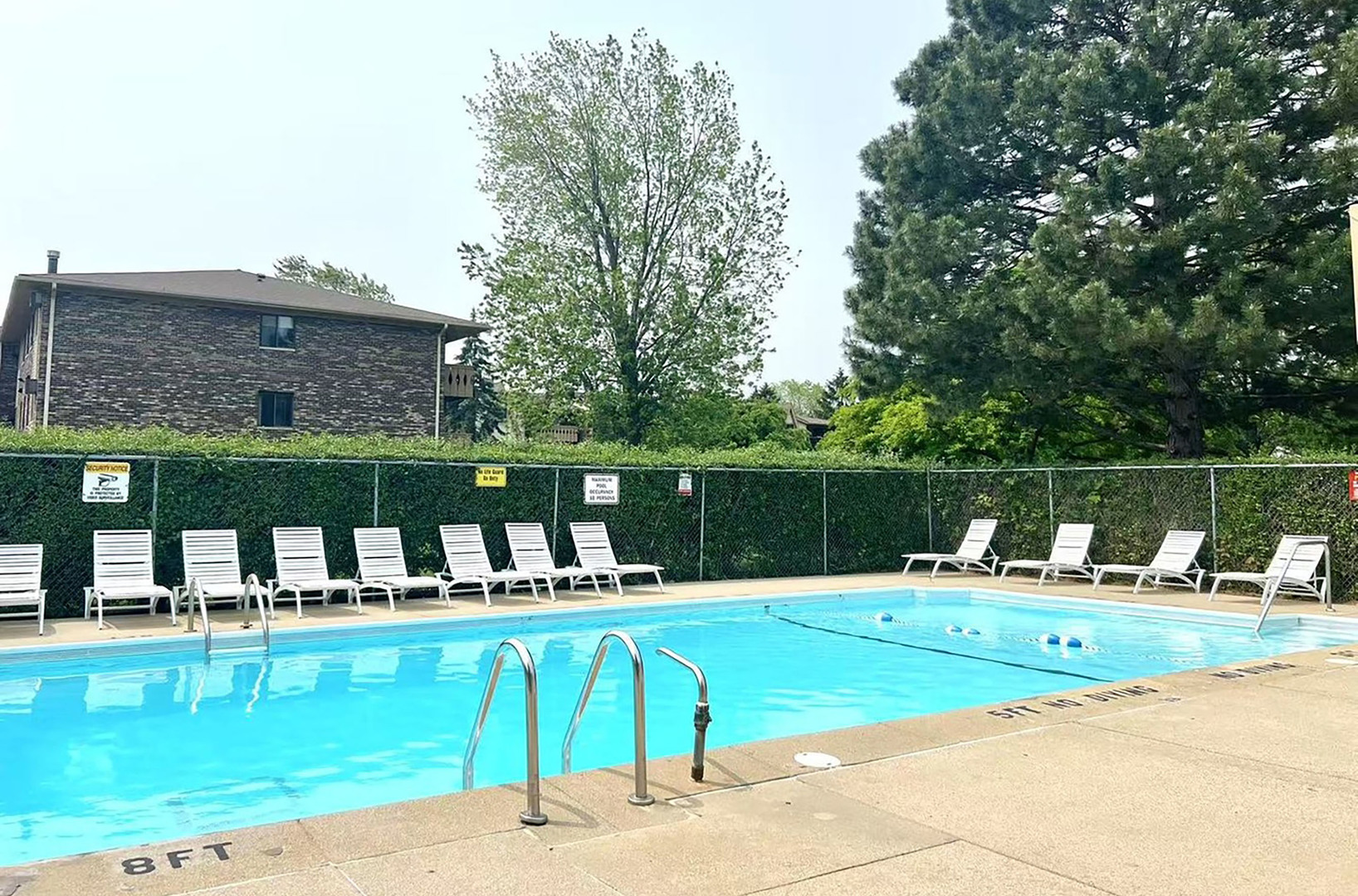 13 Timber Lane, Unit 1 Vernon Hills, IL 60061 - Photo 11 of 13 a house view with a outdoor seating space