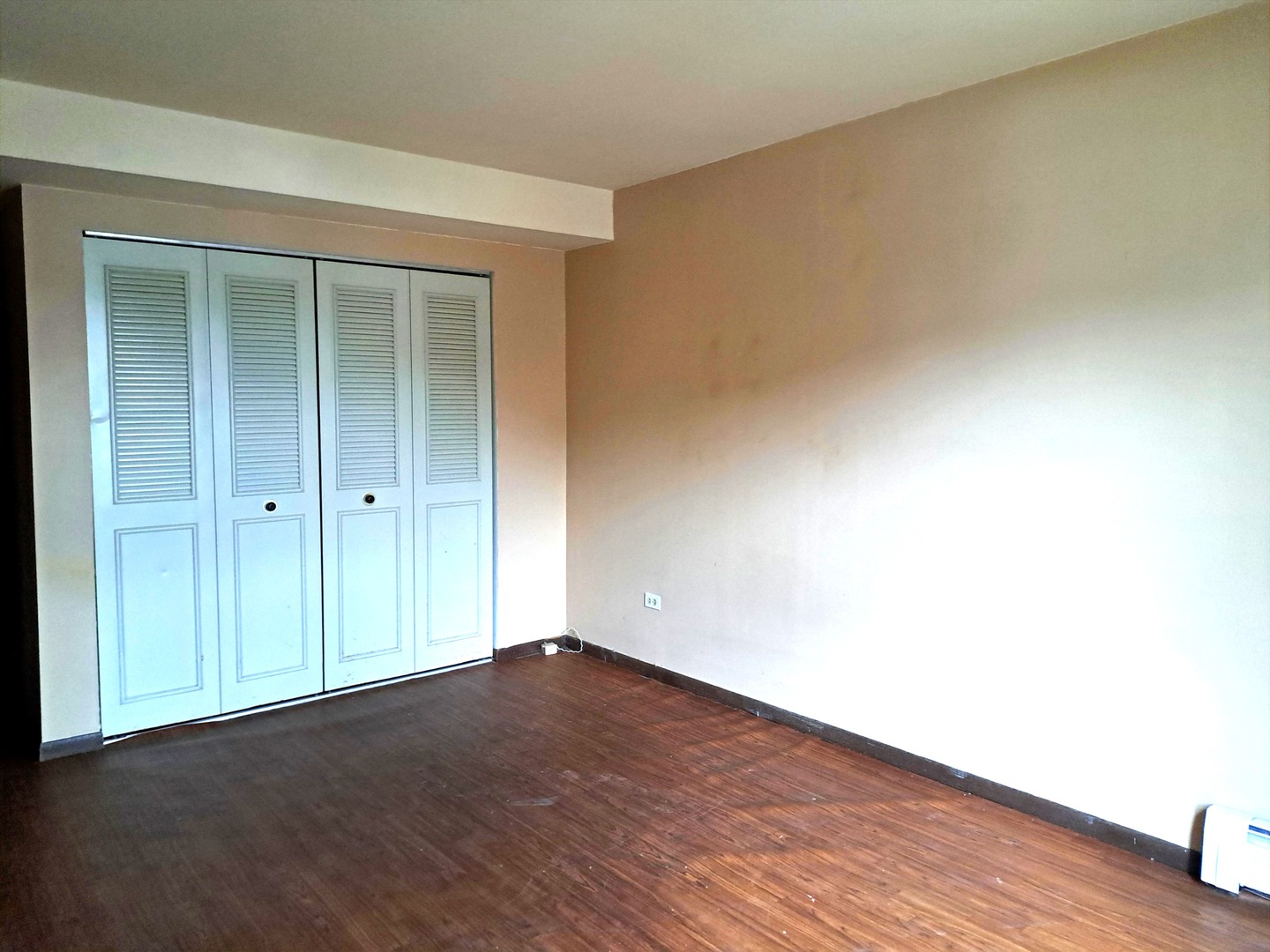 13 Timber Lane, Unit 1 Vernon Hills, IL 60061 - Photo 7 of 13 an empty room with wooden floor