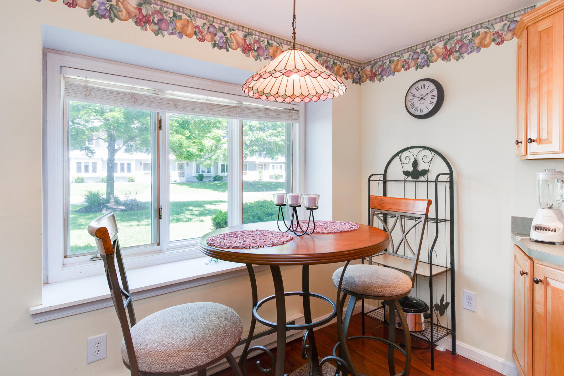 174 Lowell Road, Unit U14 Mashpee, MA 02649 - Photo 14 of 31 a view of a dining room with furniture window and outside view