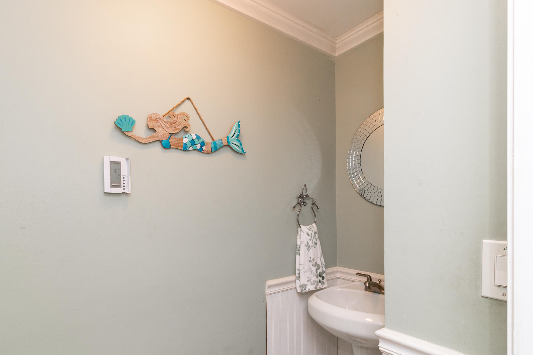 174 Lowell Road, Unit U14 Mashpee, MA 02649 - Photo 16 of 31 a bathroom with a sink a mirror and a toilet