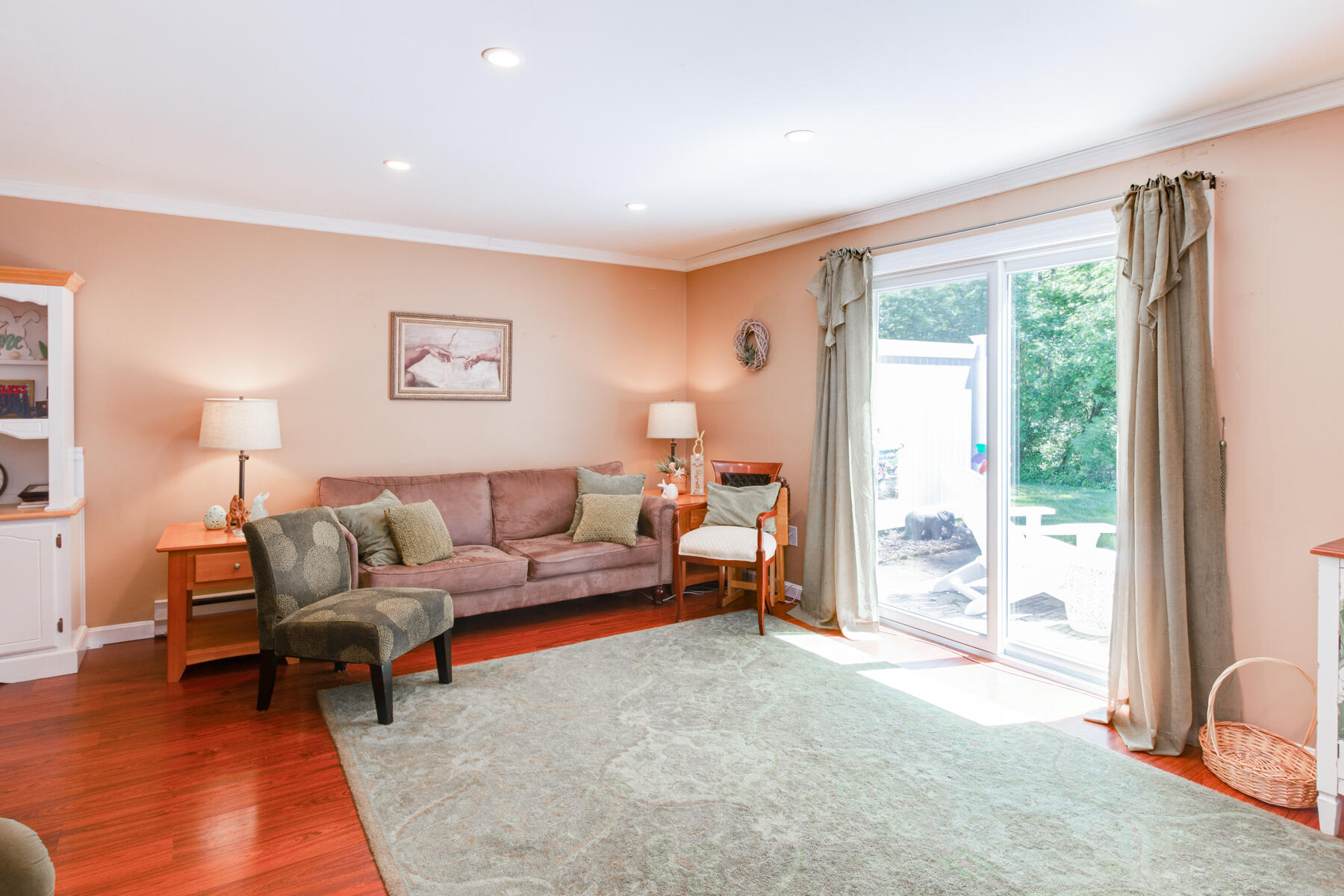174 Lowell Road, Unit U14 Mashpee, MA 02649 - Photo 19 of 31 a living room with furniture and a large window