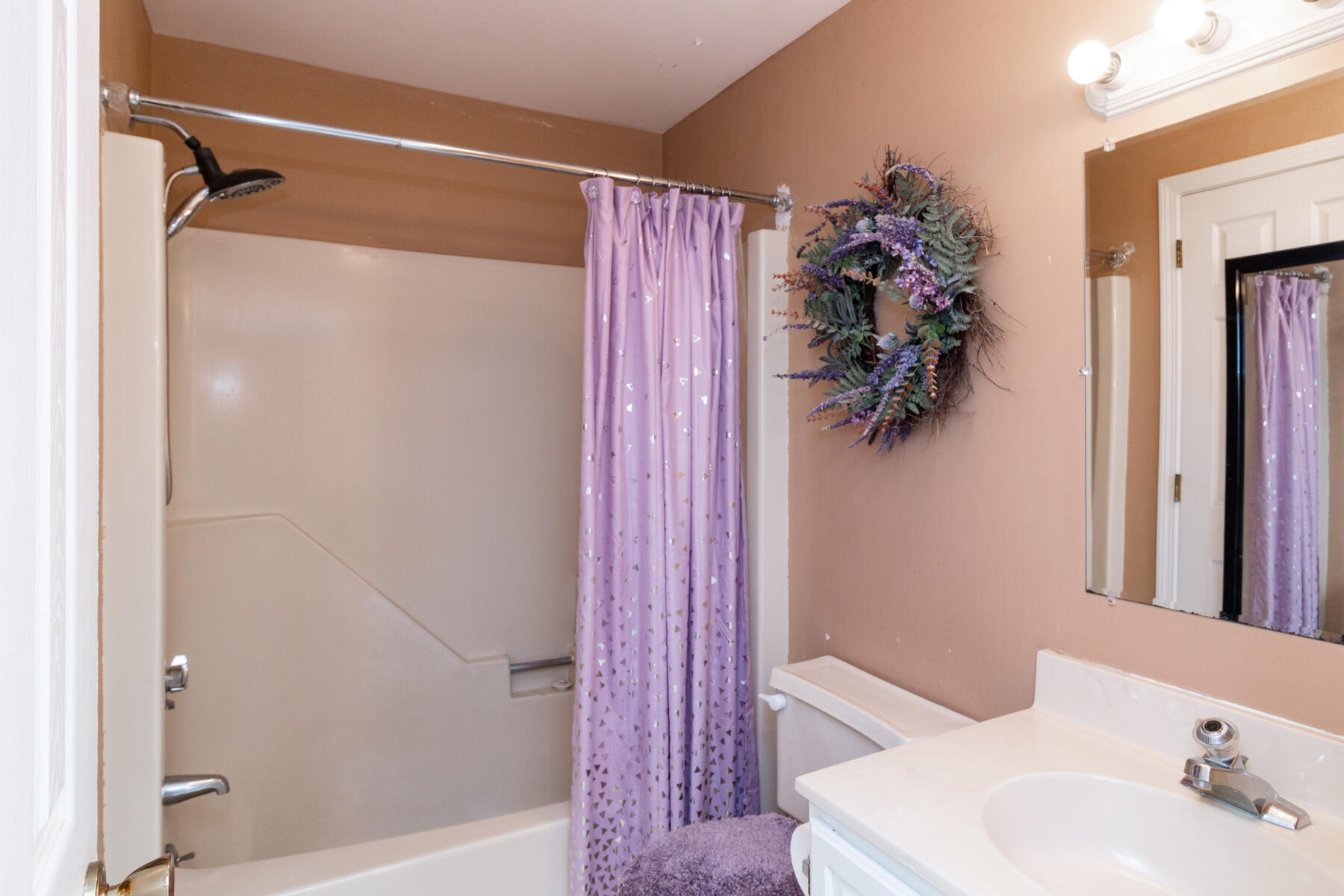 174 Lowell Road, Unit U14 Mashpee, MA 02649 - Photo 27 of 31 a bathroom with a shower and a sink