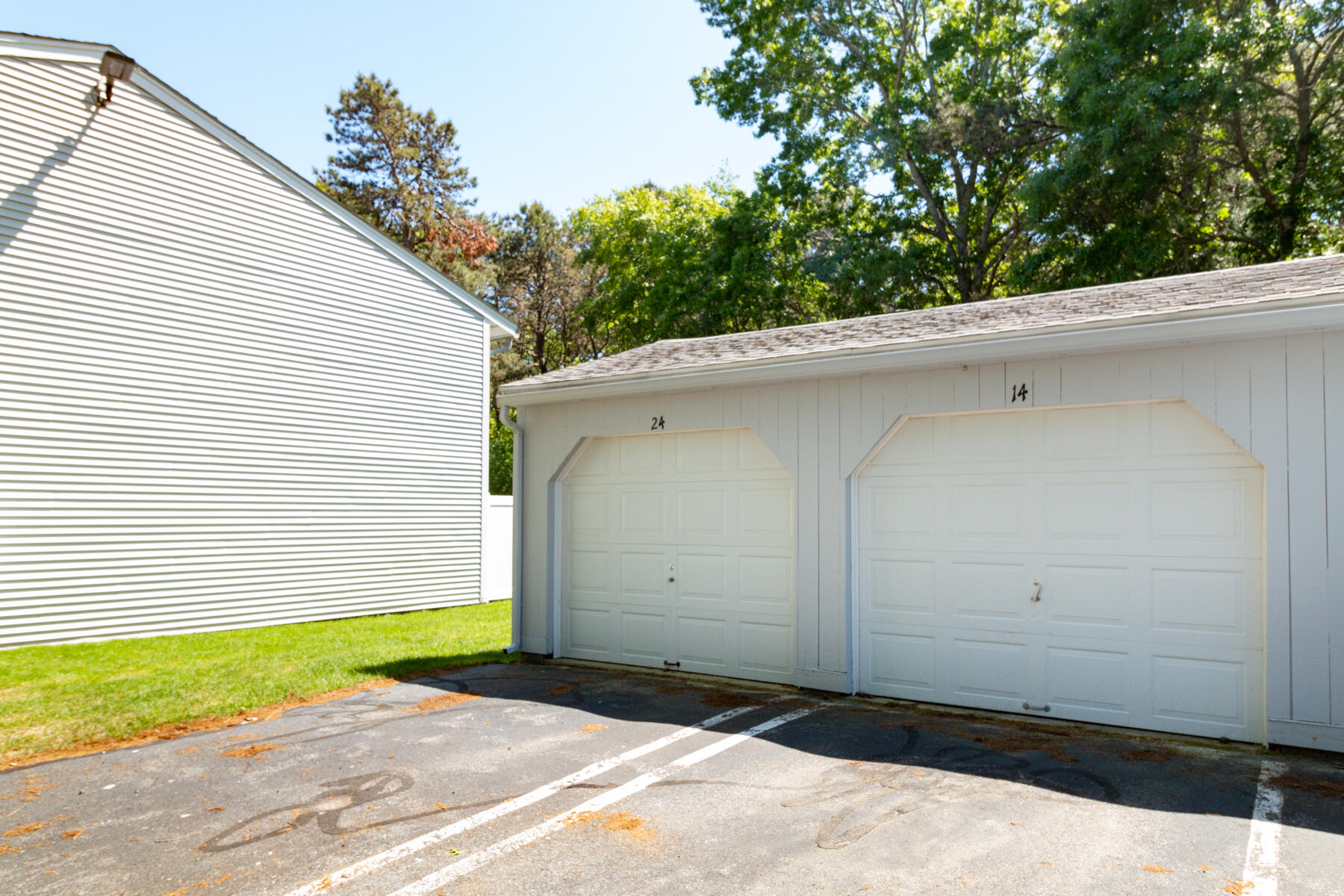174 Lowell Road, Unit U14 Mashpee, MA 02649 - Photo 9 of 31 a view of a garage