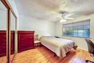 a bathroom with a sink a vanity and a mirror