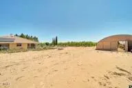 a view of a balcony with wooden floor