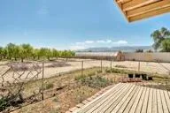 a view of a yard and lake view