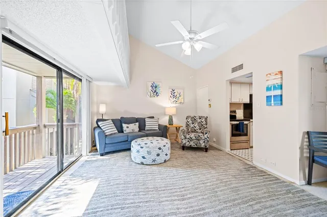a view of a livingroom with furniture and wooden floor