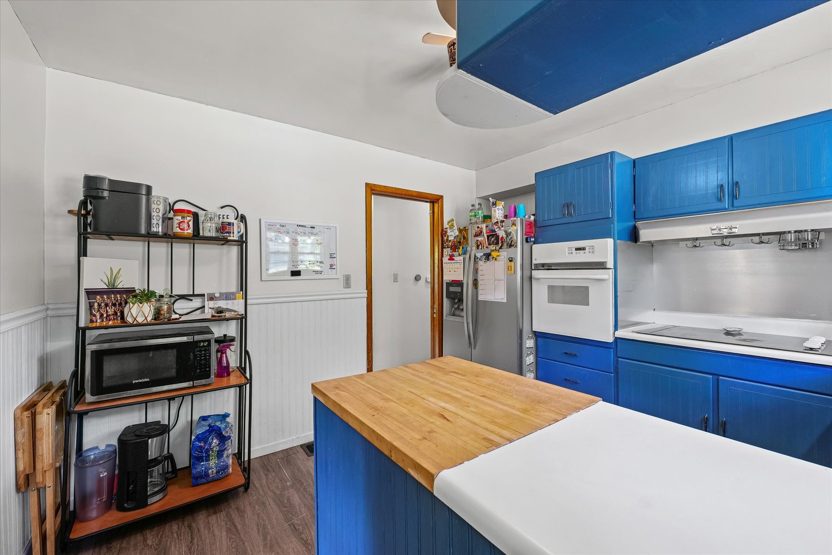 449 South Irving Street Monticello, IL 61856 - Photo 11 of 33 a kitchen with stainless steel appliances a stove a refrigerator and cabinets