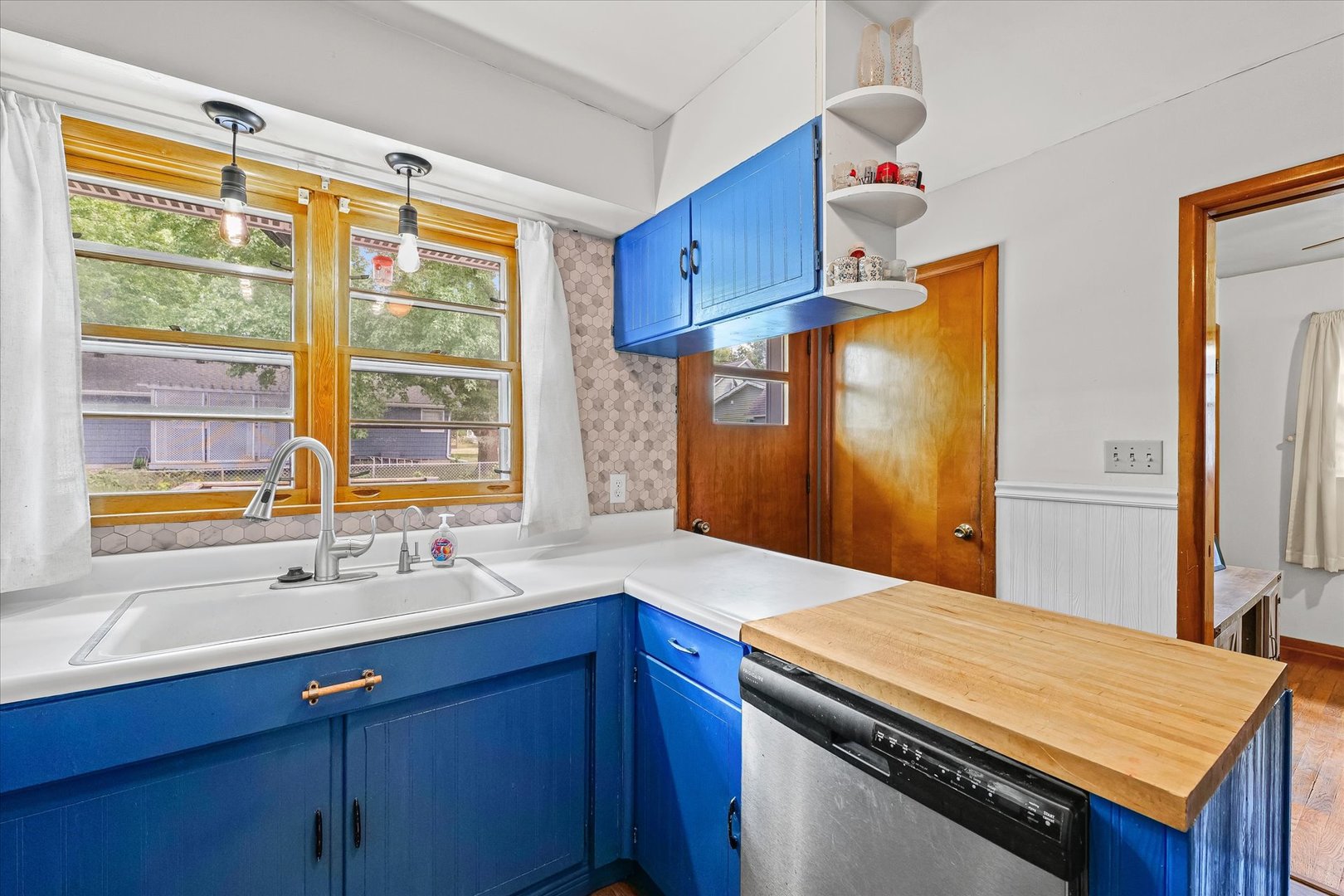 449 South Irving Street Monticello, IL 61856 - Photo 14 of 33 a room with a sink and a mirror