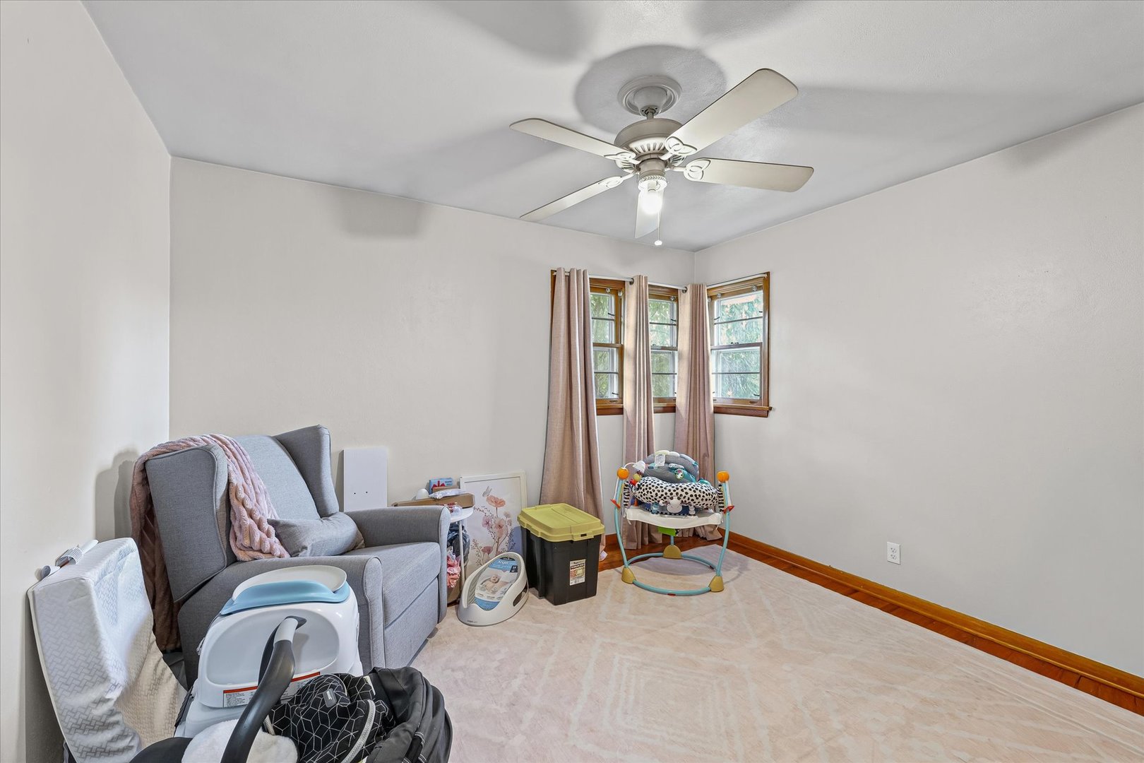 449 South Irving Street Monticello, IL 61856 - Photo 18 of 33 a living room with furniture and a large window