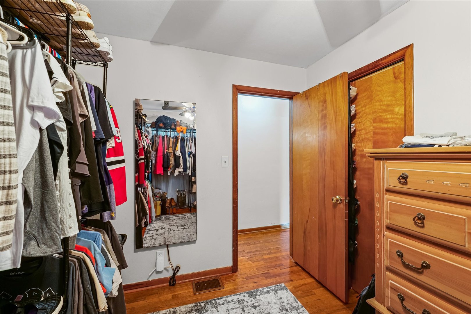 449 South Irving Street Monticello, IL 61856 - Photo 21 of 33 a view of walk in closet with clothes