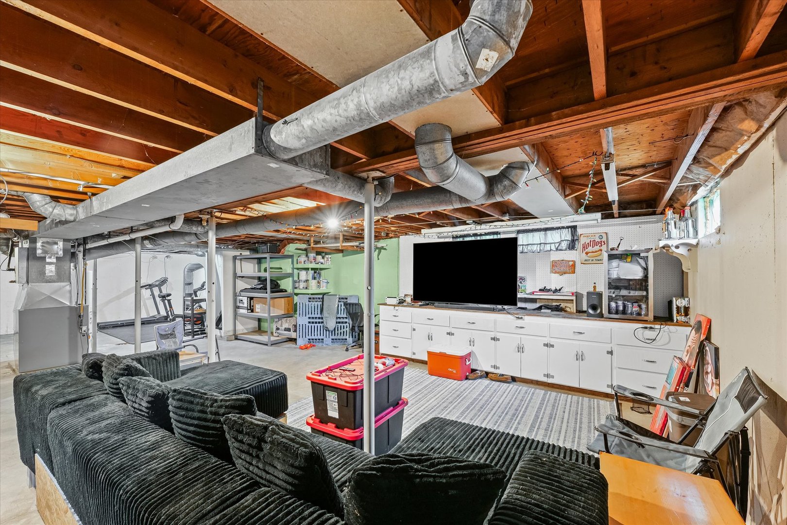 449 South Irving Street Monticello, IL 61856 - Photo 27 of 33 a room with furniture and a flat screen tv