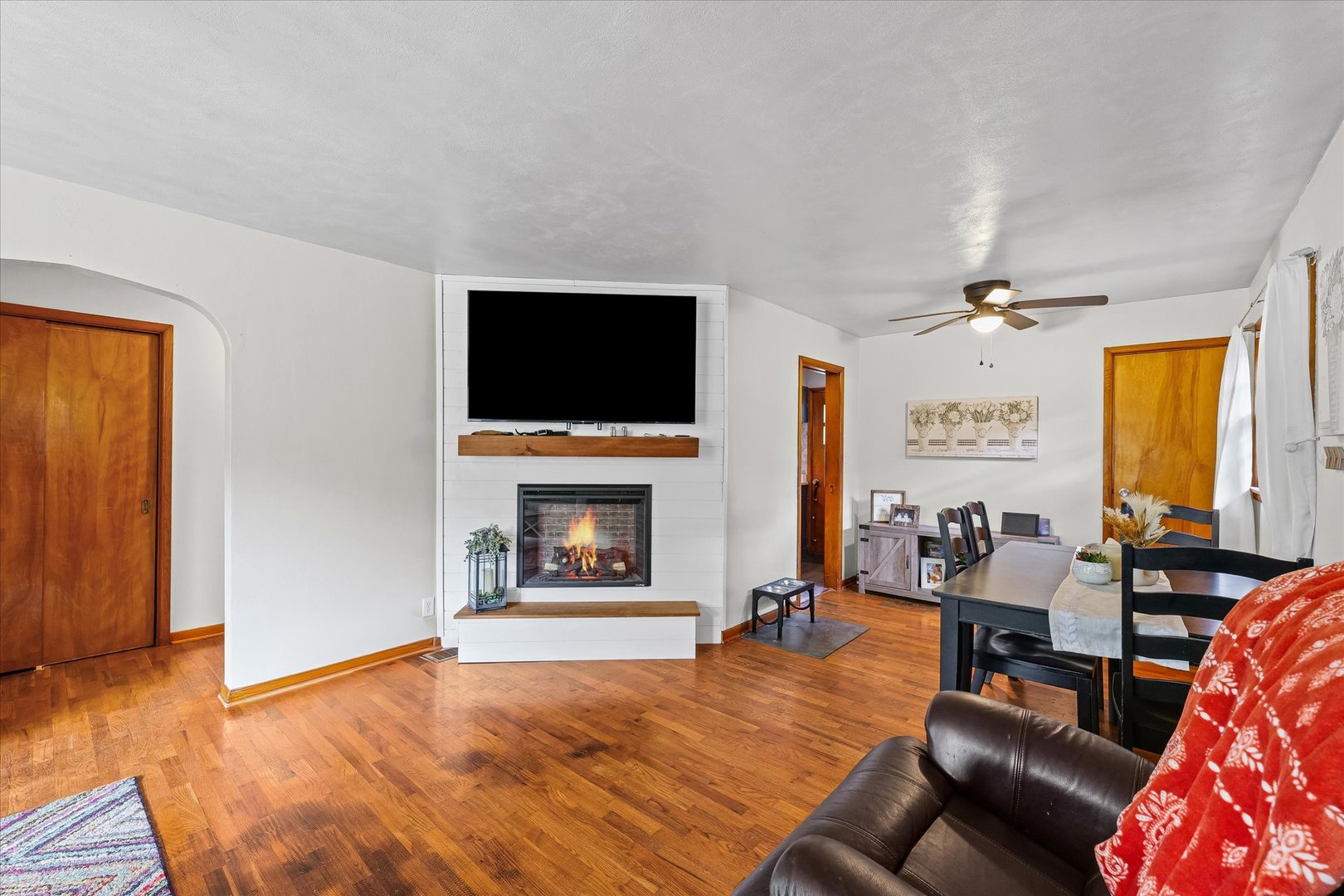 449 South Irving Street Monticello, IL 61856 - Photo 6 of 33 a living room with furniture and a fireplace or television
