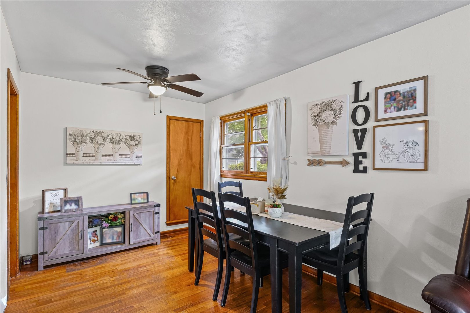 449 South Irving Street Monticello, IL 61856 - Photo 9 of 33 a view of a dining room with furniture window and wooden floor
