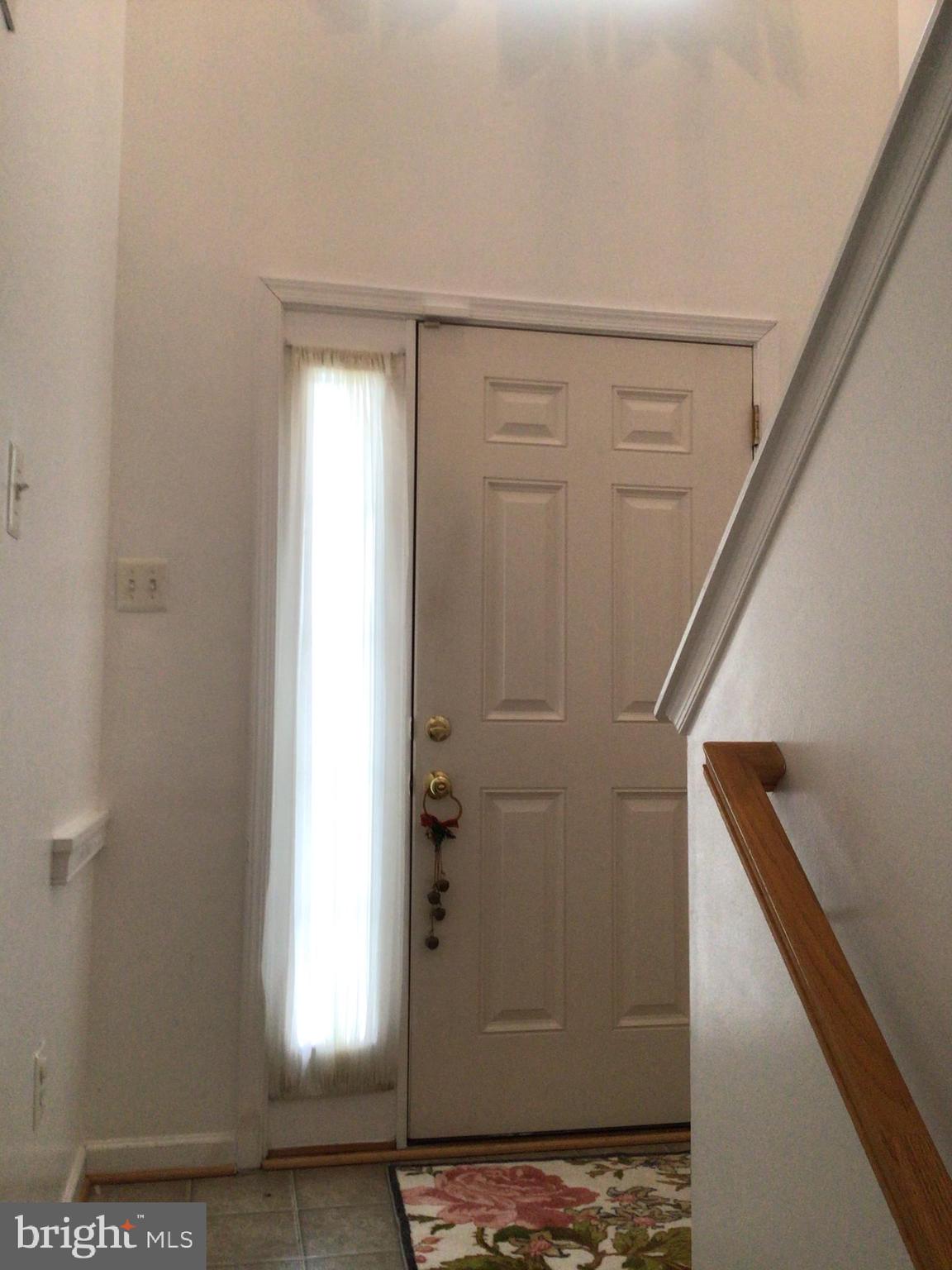 834 Lowe Road Baltimore, MD 21220 - Photo 9 of 39 Front entry door from lower den level