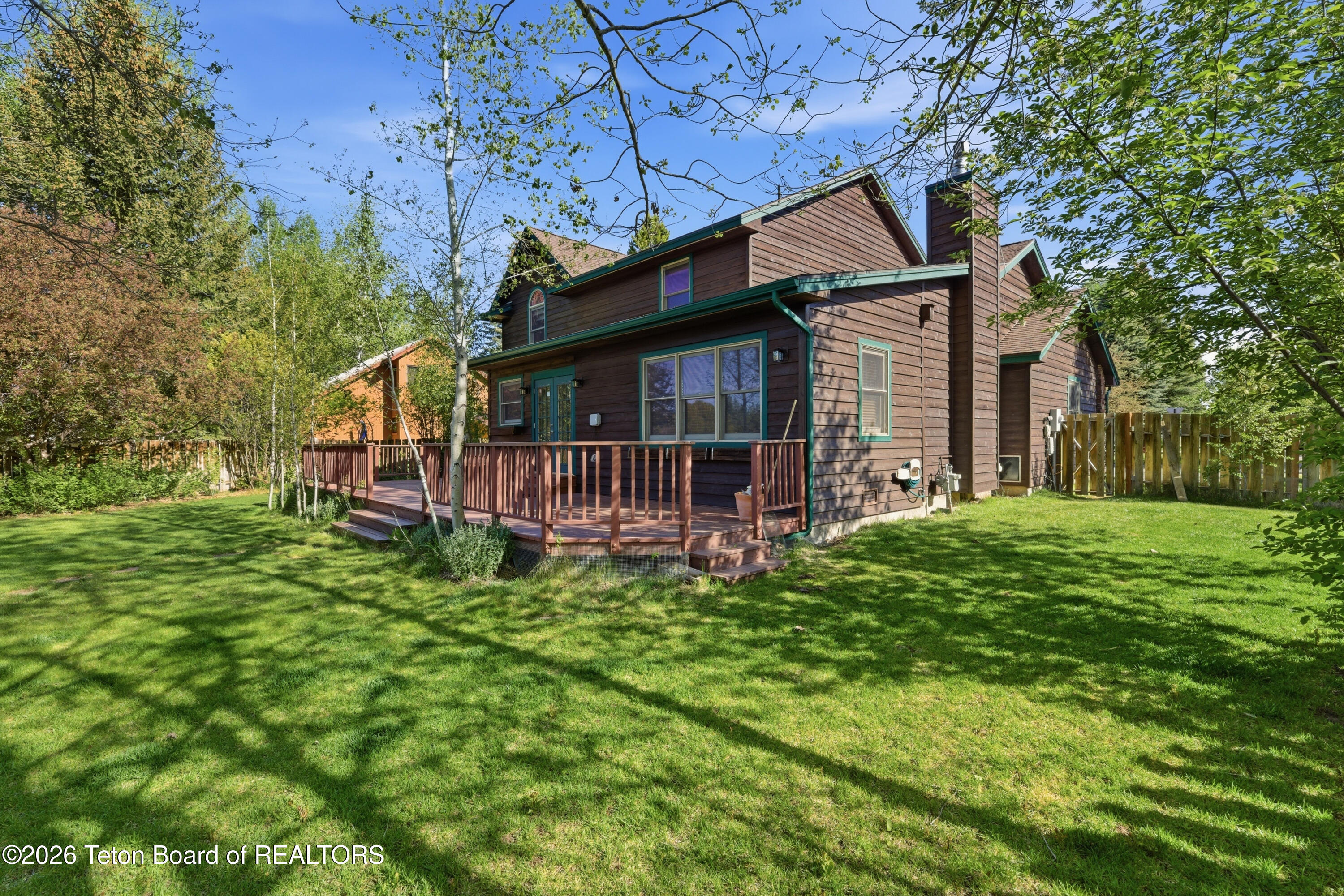 Rear Facade and Yard Summer