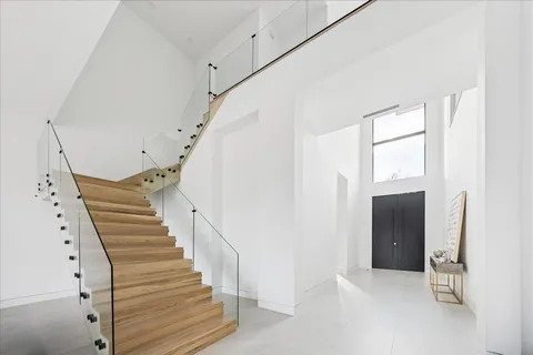 a view of entryway with wooden floor
