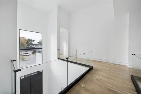 a room with a bed and a window