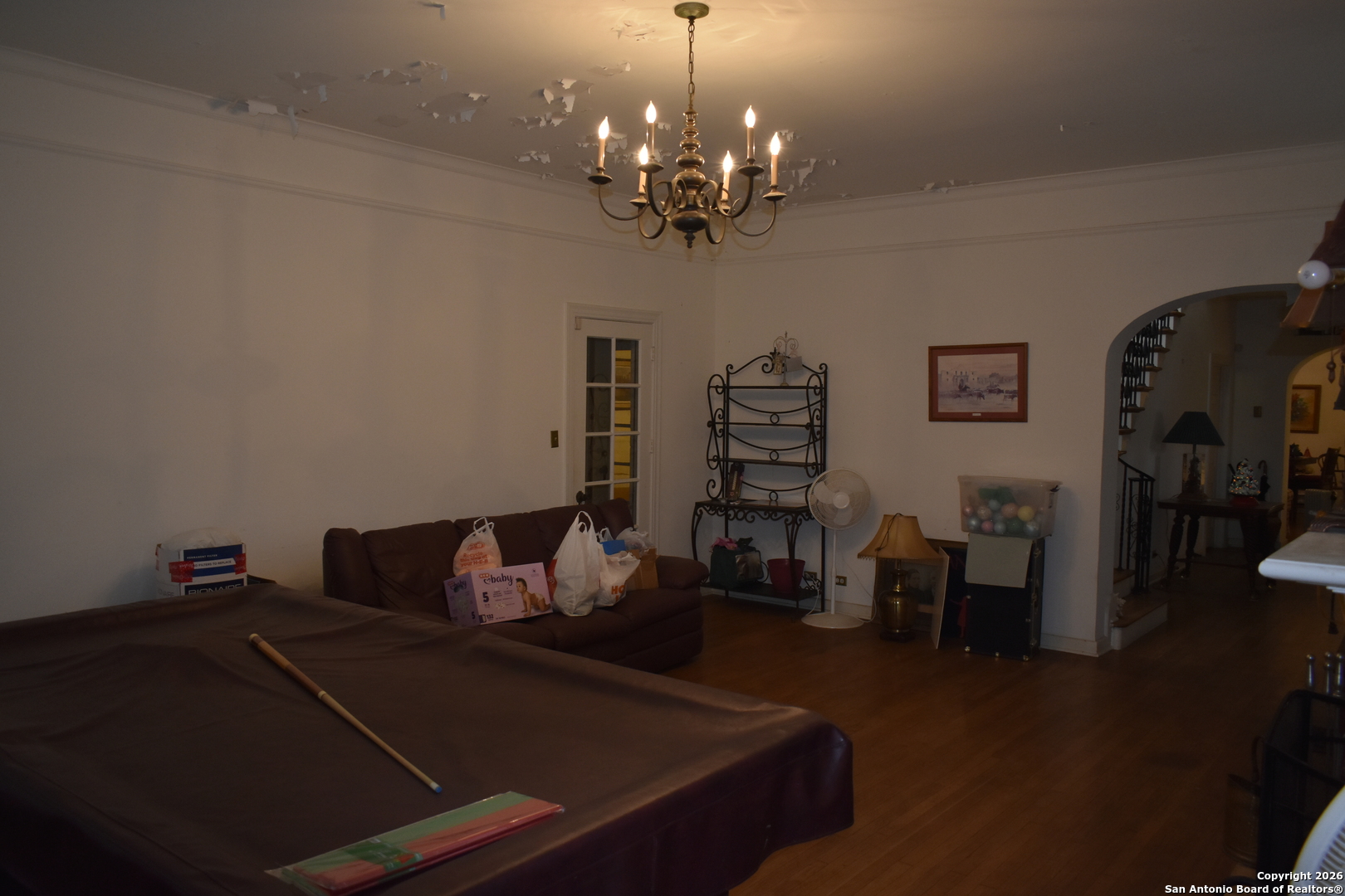 320 Babcock Road San Antonio, TX 78201 - Photo 12 of 27 a living room with furniture and a chandelier
