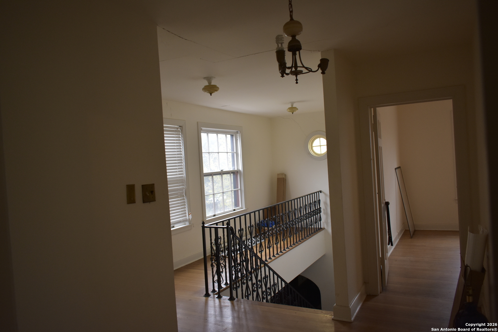 320 Babcock Road San Antonio, TX 78201 - Photo 14 of 27 a view of a hallway with windows and stairs