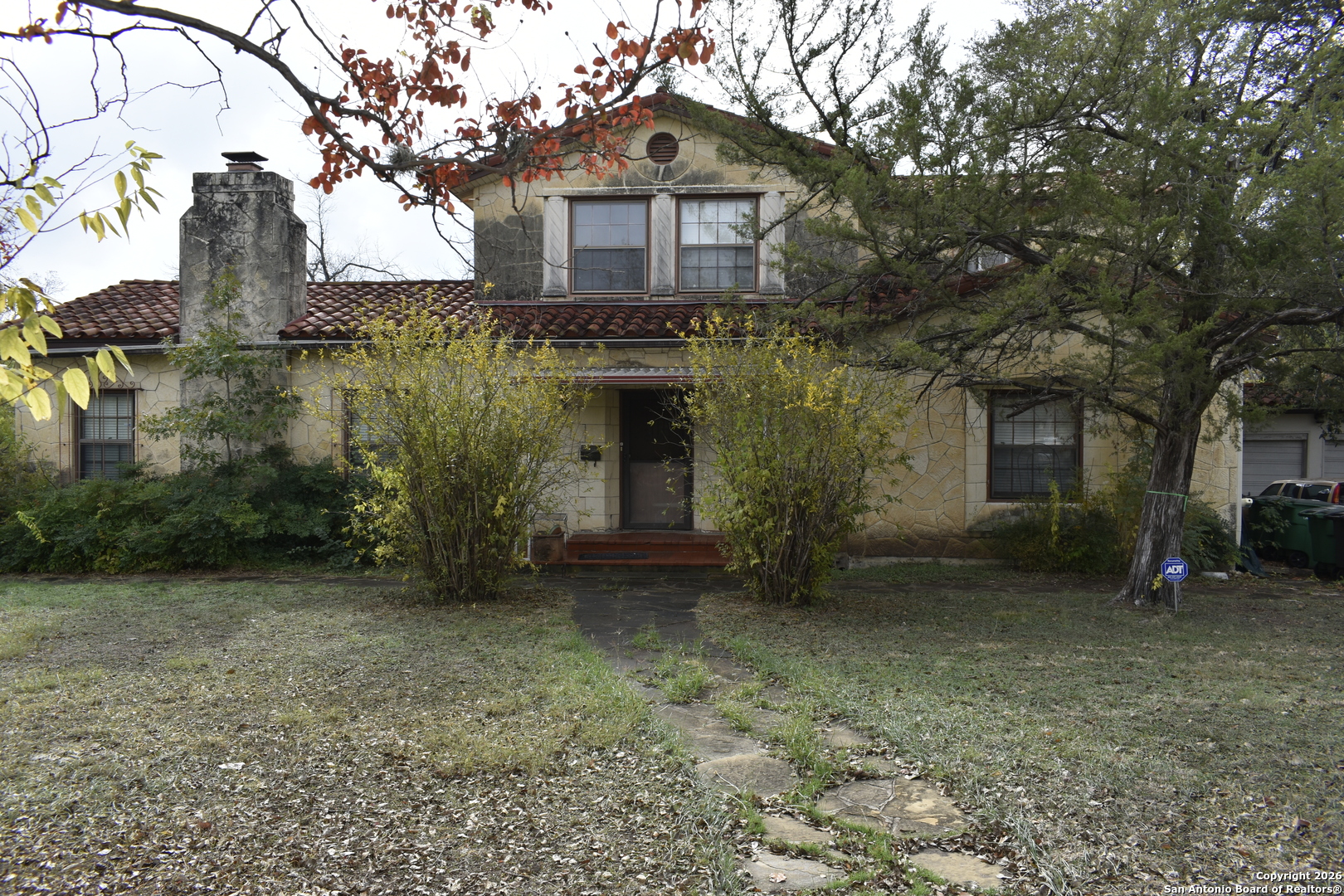 320 Babcock Road San Antonio, TX 78201 - Photo 2 of 27 a view of a house with a yard and tree