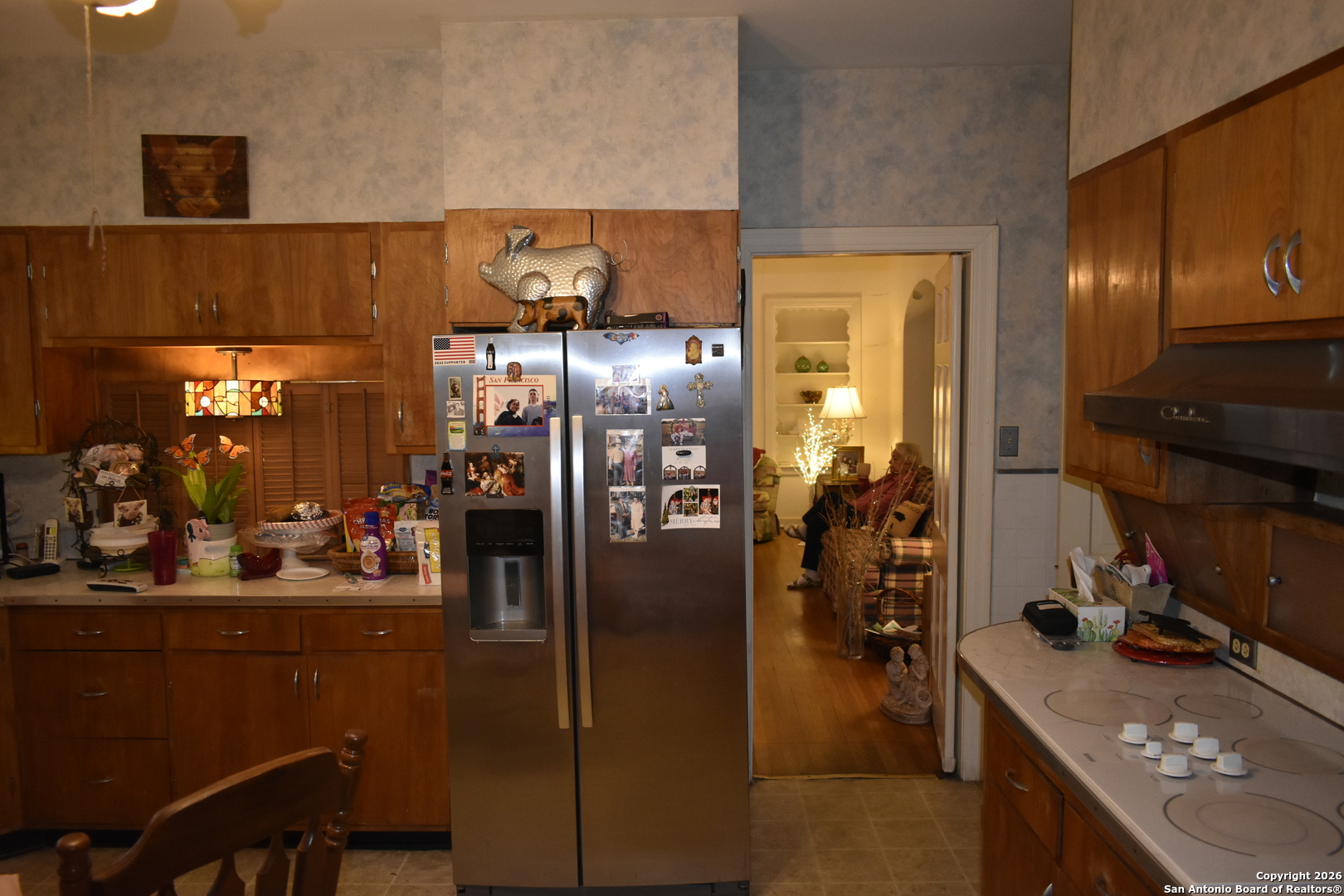 320 Babcock Road San Antonio, TX 78201 - Photo 4 of 27 a kitchen with refrigerator and cabinets