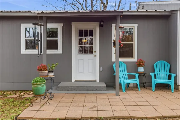 a view of a lounge chairs in the patio
