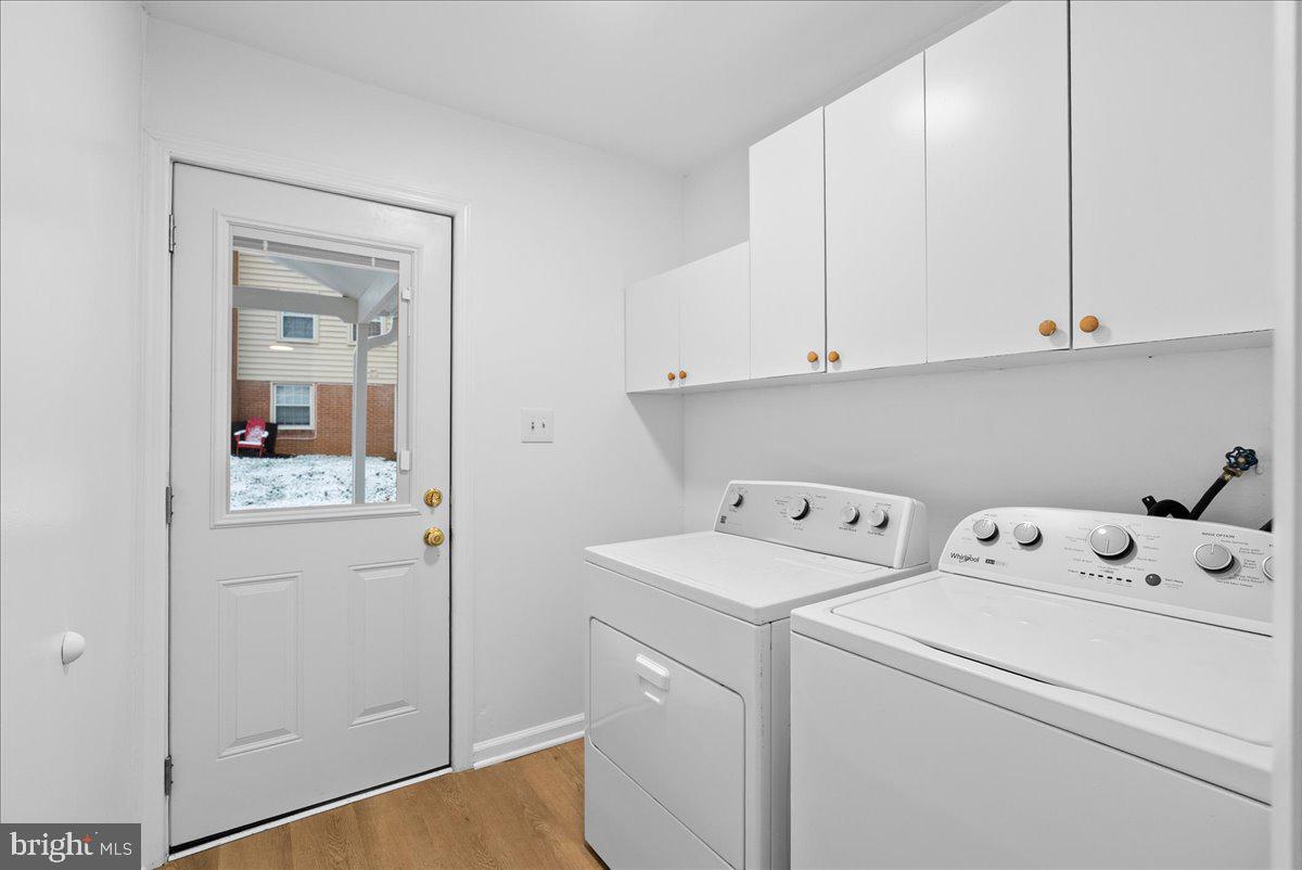 8608 Greeley Boulevard Springfield, VA 22152 - Photo 12 of 34 a view of storage and utility room with washer and dryer