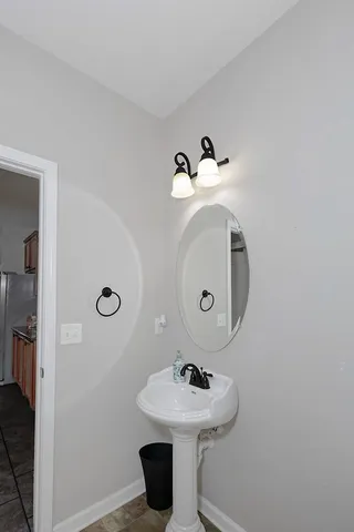 a room with window and a chair