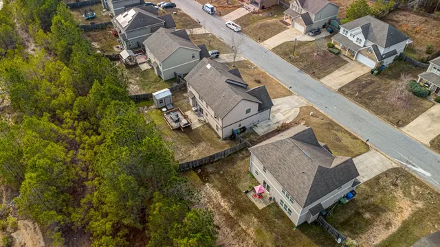 a front view of a house with yard
