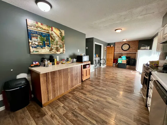 a view of a living room and dining room